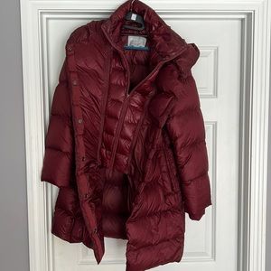 Athleta women’s puffer coat. Red. Medium.  Half zip on inside.
